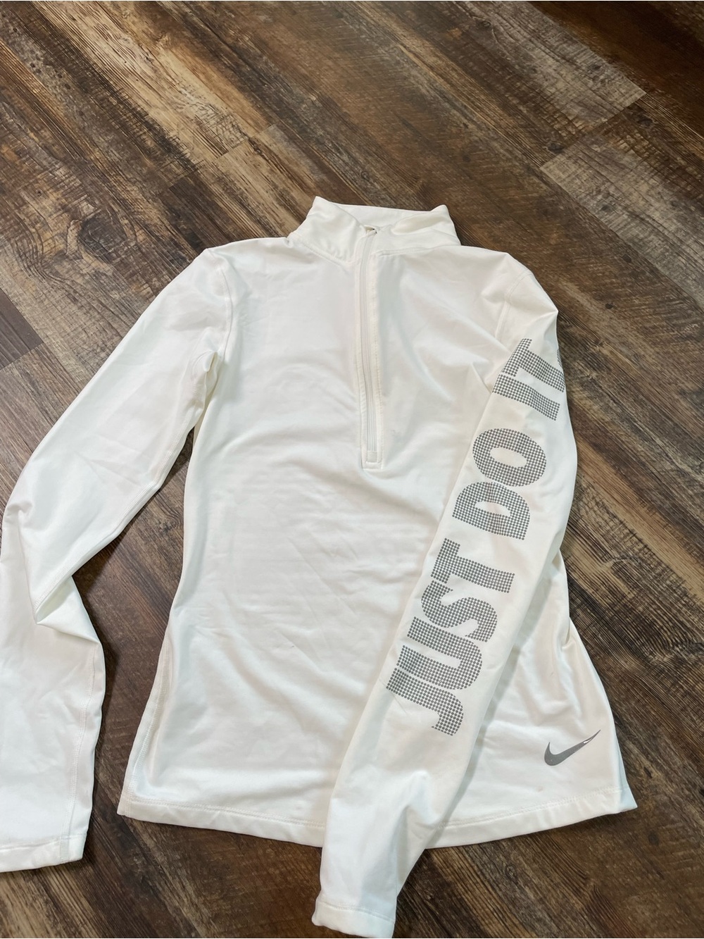 Nike White Long-Sleeve Quarter-Zip Top with 'JUST DO IT' Sleeve